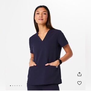 FIGS Casma three pocket scrub top in color Navy, size XS